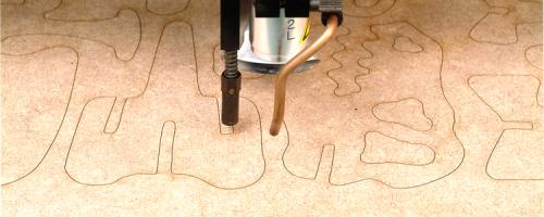 Parti di dinosauro in legno tagliate con una macchina per il taglio laser legno